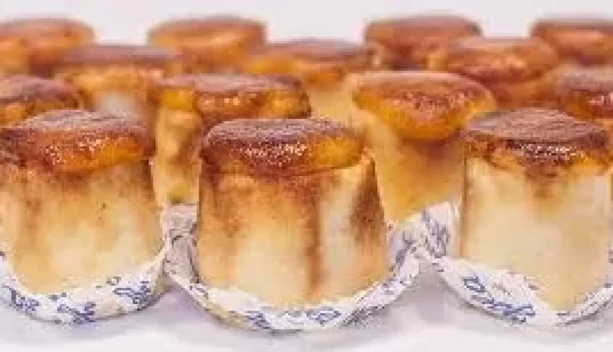 Traditional pionono dessert from Granada with toasted cream